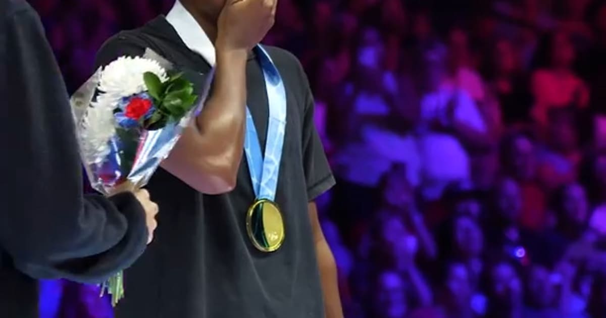 Team USA Simone Manuel Takes a Moment on the Podium After Qualifying